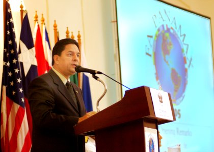 US Navy 050805-N-0962S-051 Panamanian Minister of Government and Justice Hector Aleman welcomes joint forces personnel during the opening ceremony for PANAMAX 2005 at Hotel El Panama