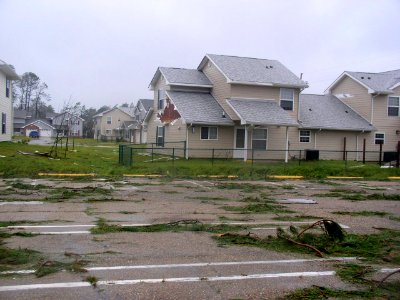 US Navy 050902-N-0000X-002 The family housing area on board Naval Construction Battalion Center (NCBC) Gulfport, Miss., shows damage from Hurricane Katrina photo