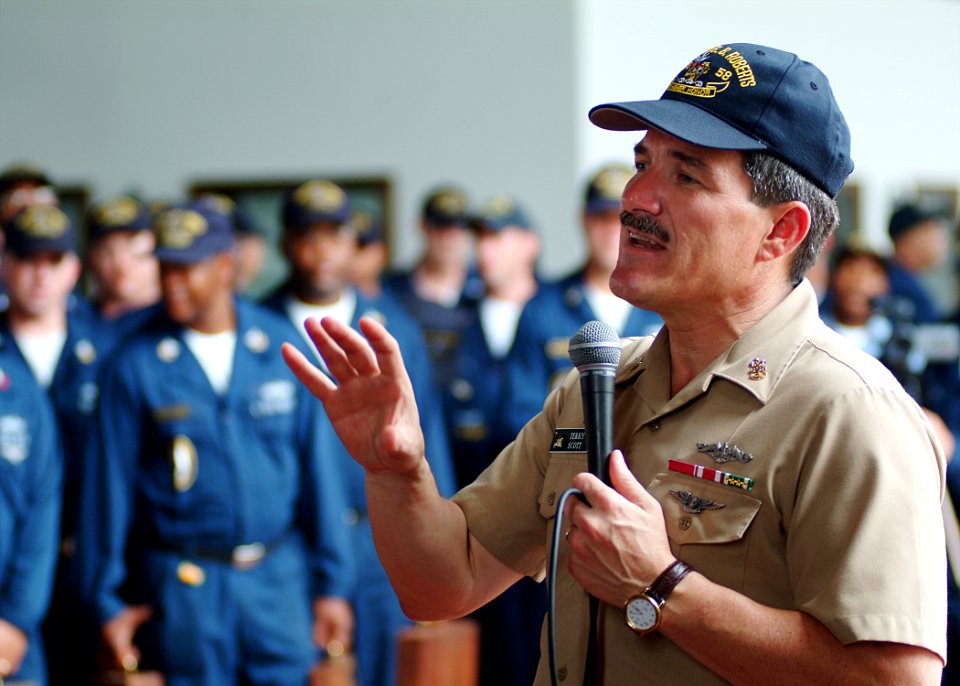 US Navy 050806-N-0962S-232 Master Chief Petty Officer of the Navy (MCPON) Terry Scott speaks to U.S. Navy Sailors and U.S. Coast Guardsmen during an all hands call