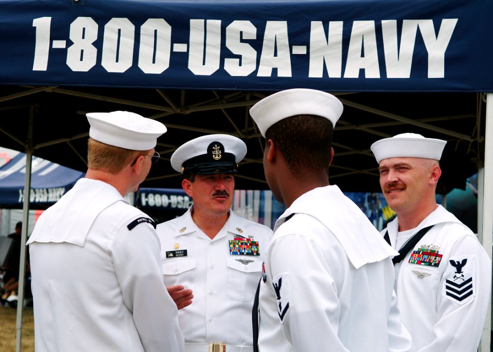 US Navy 050813-N-0962S-090 Master Chief Petty Officer of the Navy (MCPON) Terry Scott speaks with Sailors from Naval Recruiting District Buffalo and the guided missile destroyer USS McFaul (DDG 74) prior to the NASCAR Busch Ser
