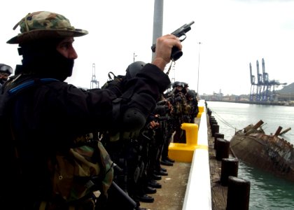 US Navy 050808-F-3177P-022 Chilean special tactics personnel prepare for a simulated at sea arrest as they train other countries as part of PANAMAX 2005