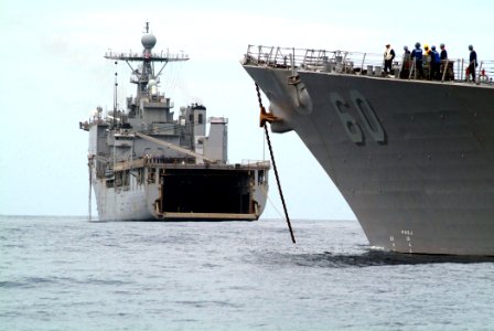 US Navy 050814-N-4772B-153 The amphibious dock landing ship USS Harpers Ferry (LSD 49) and the guided missile destroyer USS Paul Hamilton (DDG 60) prepare to take part in a tow exercise