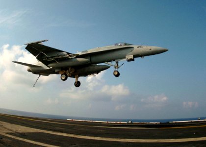 US Navy 050809-N-3488C-014 An F-A-18C Hornet prepares to land aboard the conventionally powered aircraft carrier USS Kitty Hawk (CV 63)