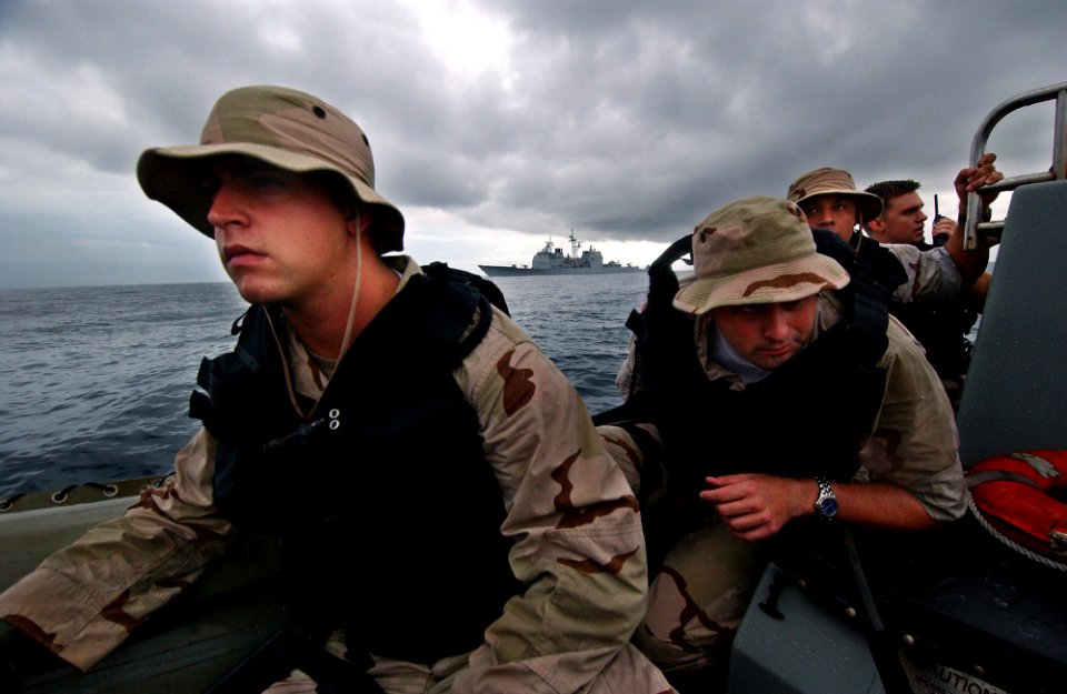 US Navy 050810-F-4883S-071 A Visit Board Search and Seizure team from the U.S. Navy guided missile cruiser USS Thomas S. Gates (CG 51), prepares to board a Panamanian vessel for a simulated medical call during PANAMAX 2005