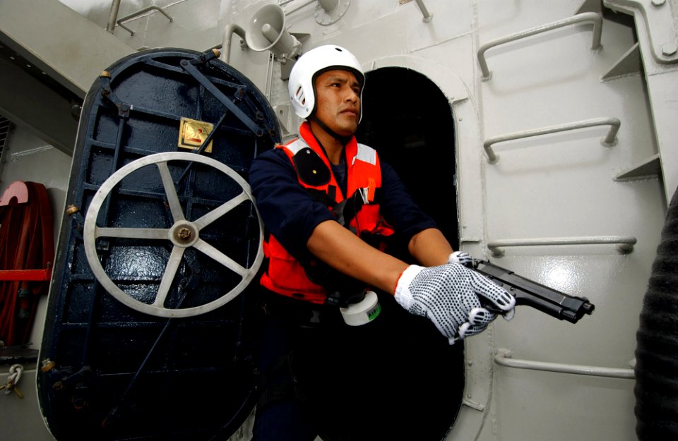 US Navy 050812-F-4883S-148 A Peruvian Navy crewman takes part in a maritime interdiction operation (MIO) drills on the Peruvian frigate BAP Villavisencio (FM 52) in support of PANAMAX 2005
