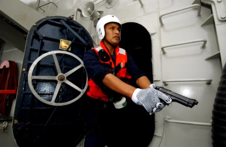 US Navy 050812-F-4883S-148 A Peruvian Navy crewman takes part in a maritime interdiction operation (MIO) drills on the Peruvian frigate BAP Villavisencio (FM 52) in support of PANAMAX 2005
