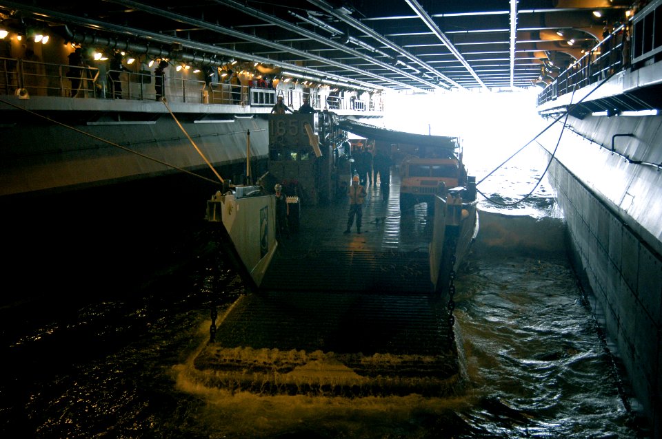US Navy 050831-N-1467R-014 A Landing Craft, Utility (LCU) assigned Assault Craft Unit Two (ACU-2), departs the well deck of the amphibious assault ship USS Bataan (LHD-5) bound for New Orleans