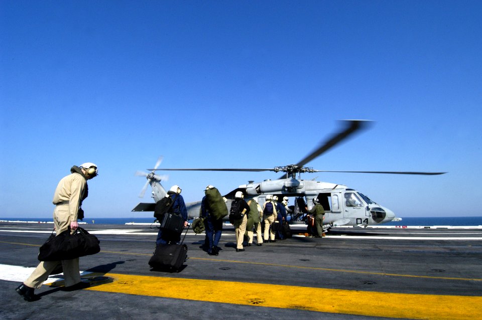 US Navy 050909-N-5328N-202 Sailors assigned to the Nimitz-class aircraft carrier USS Harry S. Truman (CVN 75) prepare to embark MH-60S Seahawk helicopter in support of Hurricane Katrina