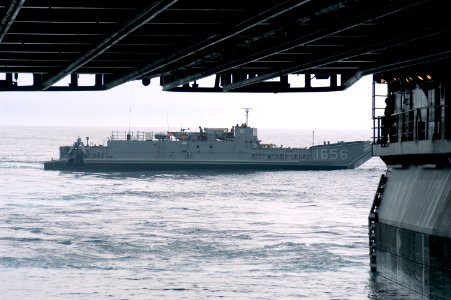 US Navy 050831-N-1467R-030 A Landing Craft, Utility (LCU) assigned Assault Craft Unit Two (ACU-2), departs the well deck of the amphibious assault ship USS Bataan (LHD-5) bound for New Orleans