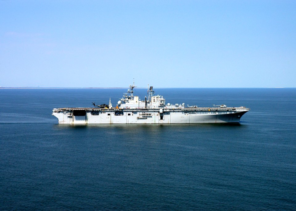 US Navy 050909-N-8154G-313 The amphibious assault ship USS Bataan (LHD 5) sits anchored off the Mississippi coast, while conducting hurricane relief efforts