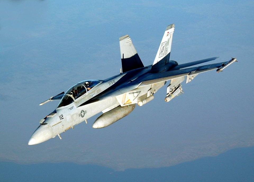 US Navy 050913-F-5480T-016 An F-A-18F Super Hornet conducts a mission over the Persian Gulf