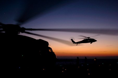 US Navy 050914-N-9866B-016 A U.S. Marine Corps UH1-N Huey helicopter, assigned to Marine Light Attack Helicopter Squadron Two Six Seven (HMLA-267), lands on the flight deck of the amphibious assault ship USS Peleliu (LHA 5)
