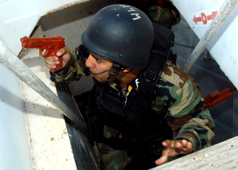 US Navy 050923-N-3019M-008 A sailor participates in a visit,board,search and seizure (VBSS) exercise