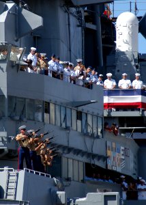 US Navy 050902-N-3019M-013 A U.S. Marine Corps rifle detail fires off a salute during the 60th anniversary of the end of World War II ceremony aboard the Battleship Missouri Memorial at Pearl Harbor