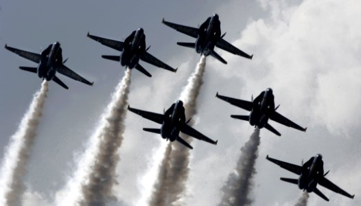 US Navy 050931-N-9769P-003 The U.S. Navy flight demonstration team, the Blue Angels, delta formation performs during the Mid-South Air Show