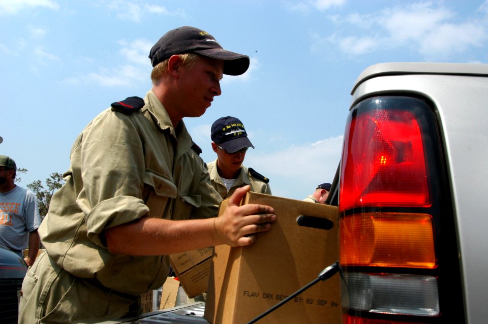 US Navy 050912-N-1467R-028 A Dutch Sailor loads a box of water as part of the voluntary efforts to help the victims of Hurricane Katrina at the First Baptist Church in Biloxi