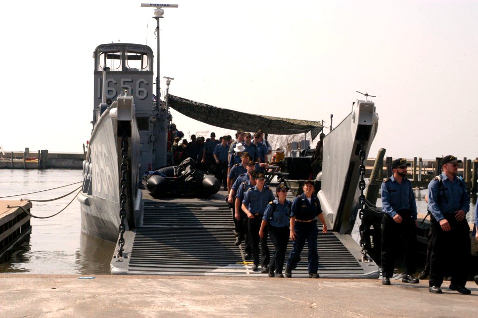 US Navy 050913-N-0793G-001 Canadian Sailors and soldiers disembark a Landing Craft Unit (LCU) onto the beaches of Biloxi, from their ships operating in the area