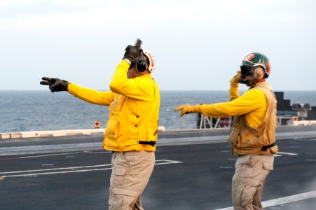 USS Carl Vinson EO directs aircraft 141101-N-HD510-020