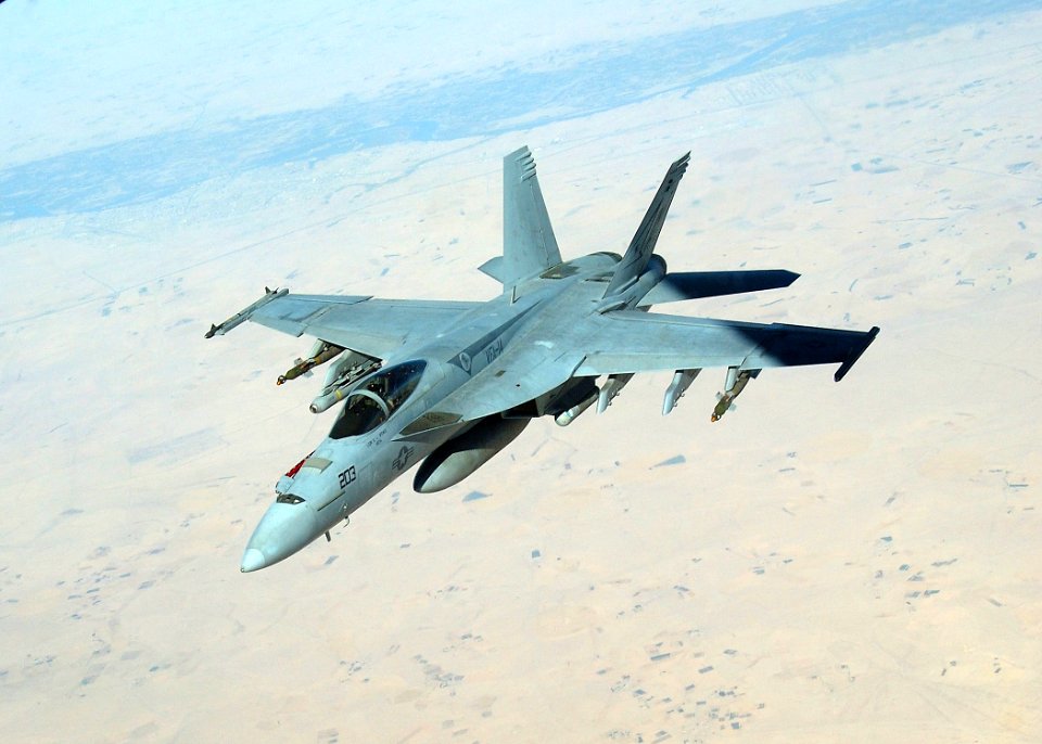 US Navy 050915-F-5480T-013 An F-A-18E Super Hornet conducts a mission over the Persian Gulf region