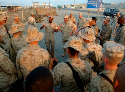 US Navy 051012-N-0962S-118 Master Chief Petty Officer of the Navy (MCPON) Terry Scott and Sergeant Major of the Marine Corps John Estrada speak to a group of Sailors and Marines