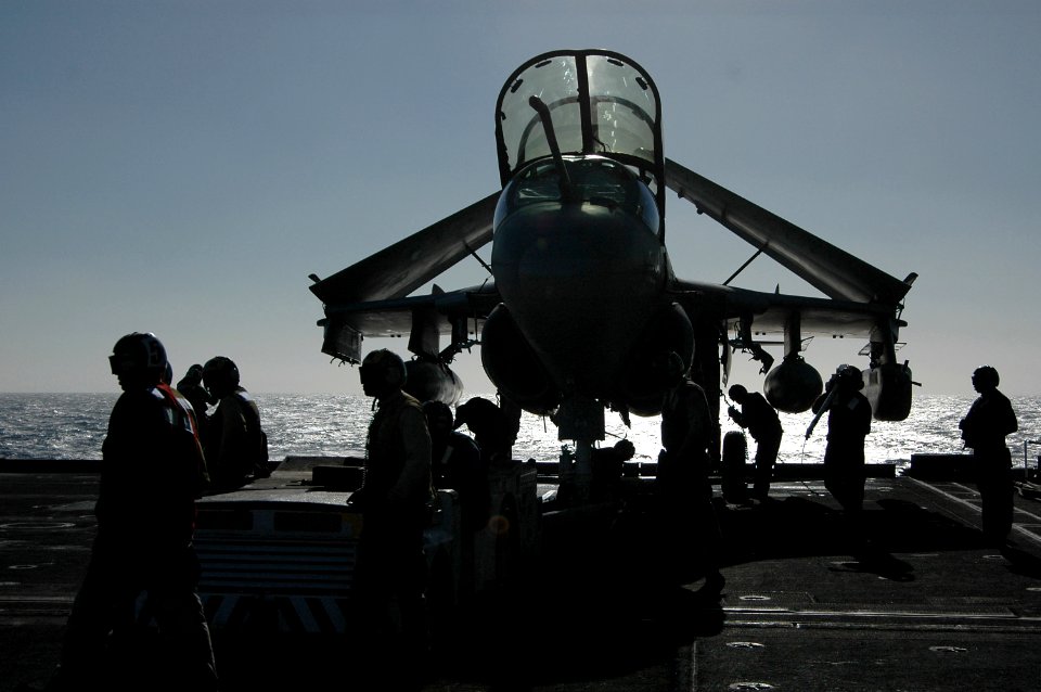 US Navy 051013-N-3570S-008 Sailors perform maintenance on one of their squadron's EA-6B Prowlers on the flight deck aboard the nuclear-powered aircraft carrier USS Nimitz (CVN 68)