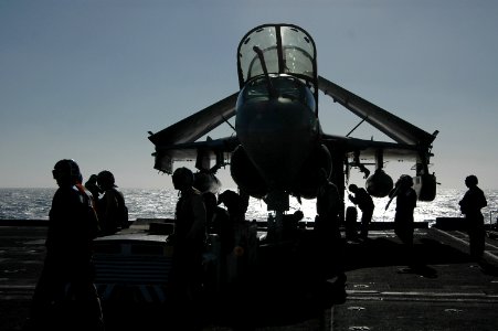 US Navy 051013-N-3570S-008 Sailors perform maintenance on one of their squadron's EA-6B Prowlers on the flight deck aboard the nuclear-powered aircraft carrier USS Nimitz (CVN 68) photo