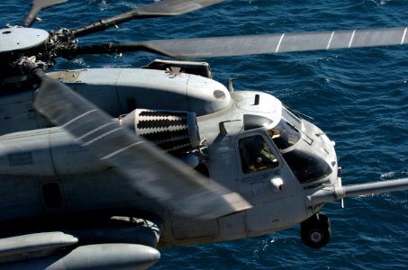 US Navy 050907-N-9866B-012 A U.S. Marine Corps CH-53E Super Stallion helicopter prepares to for landing aboard the amphibious assault ship USS Peleliu (LHA 5) photo