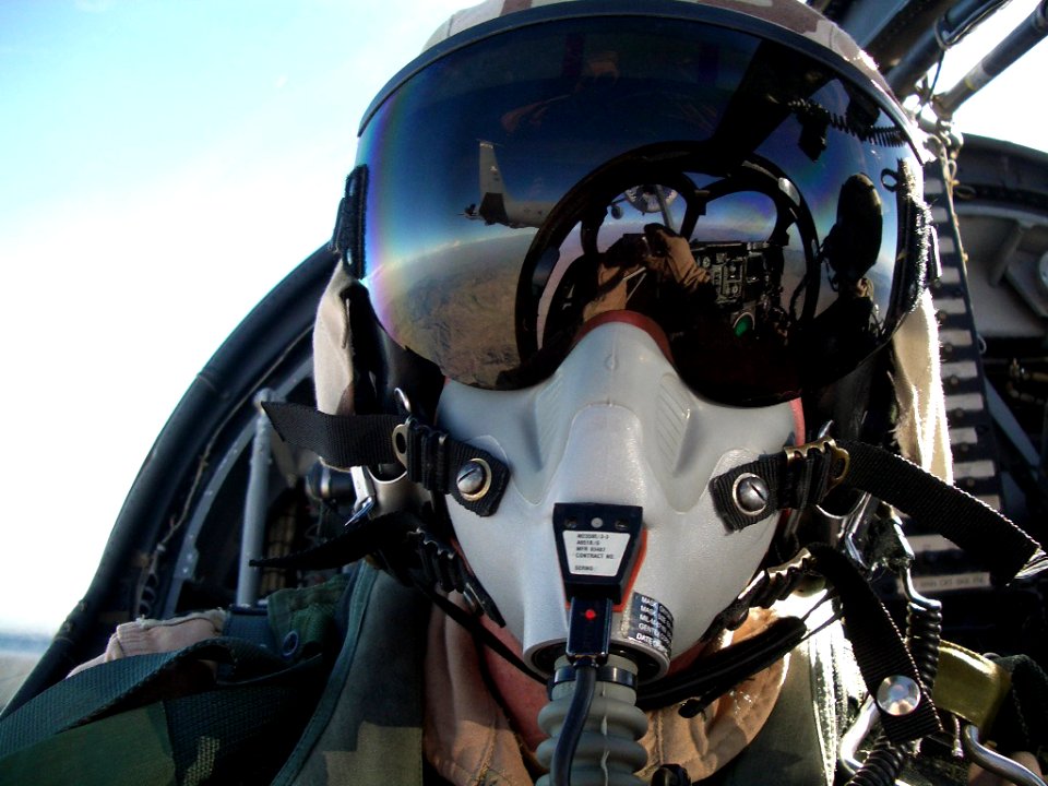 US Navy 050926-N-6751L-009 A U.S. Air Force KC-135 is reflected on the sun visor of a U.S. Navy pilot as he conducts in-flight refueling of his EA-6B Prowler