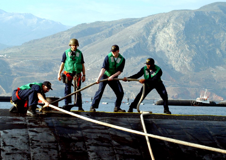 US Navy 051018-N-0780F-004 Sailors handle mooring lines as the Los Angeles-class attack submarine USS San Juan (SSN 751) arrives for a port visit