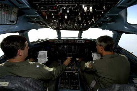 US Navy 050909-N-5328N-358 U.S. Navy Cmdr. James McSweeney, and Cmdr. Robert Velez, pilot a C-9 Skytrain cargo plane from the Hurricane Katrina staging area at Sherman Field aboard Naval Air Station Pensacola