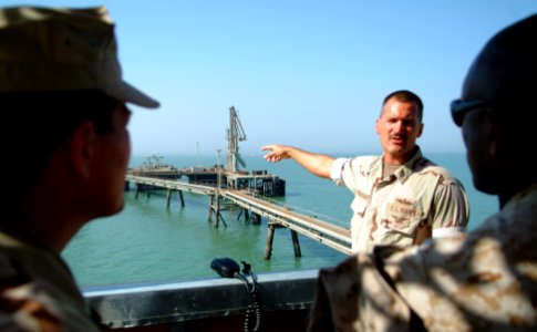 US Navy 051013-N-0962S-151 Master Chief Petty Officer of the Navy (MCPON) Terry Scott and Sgt. Maj. of the Marine Corps John Estrada watch as the senior enlisted leader aboard (KAAOT) points out various areas of the terminal