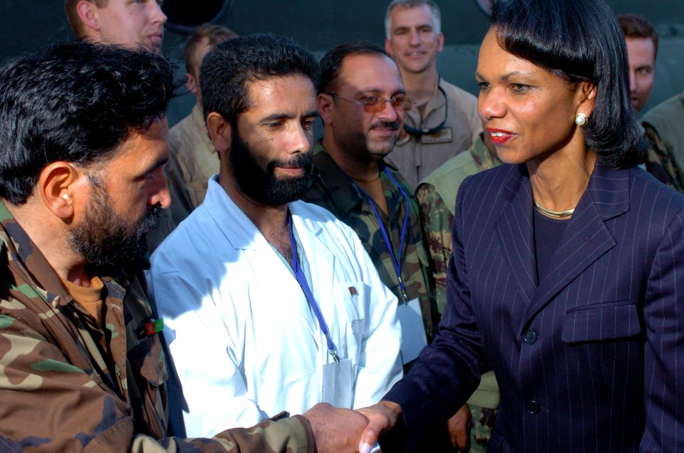 US Navy 051012-N-8796S-402 U.S. Secretary of State Condoleeza Rice shakes hands with a member of the Pakistani military during a visit to the Pakistan Air Force Base in Chaklala, Pakistan to witness multinational relief efforts