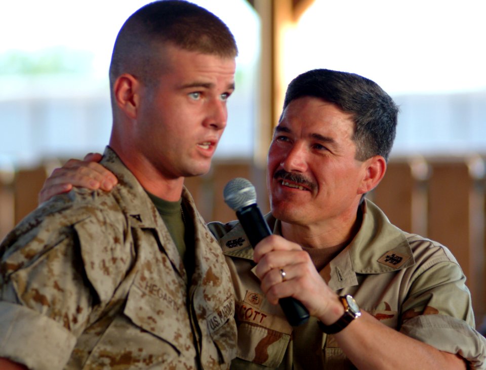 US Navy 051011-N-0962S-107 Master Chief Petty Officer of the Navy (MCPON) Terry Scott takes a question from a U.S. Marine directed toward Sergeant Major of the Marine Corps John Estrada