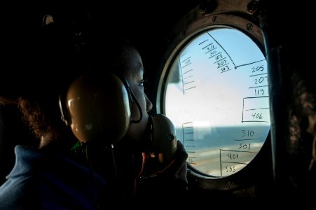 USS Carl Vinson Sailor monitors flight deck activity 141022-N-TP834-150