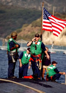 US Navy 051018-N-0780F-006 Crew members of Los Angeles-class attack submarine USS San Juan (SSN 751) work to complete mooring operations after the submarine arrived for a port visit