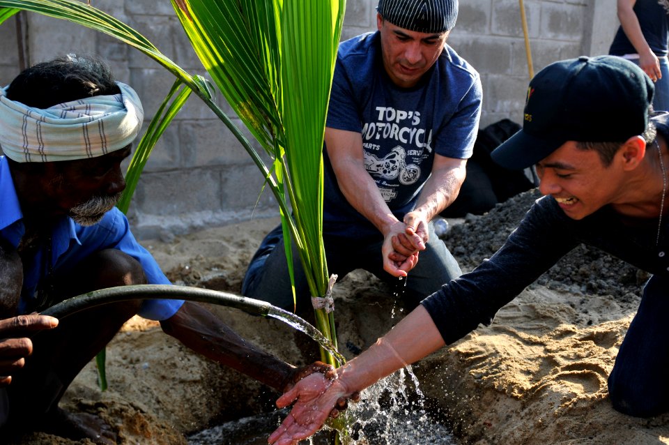 USS Carl Vinson sailors help plant neem 120408-N-UT411-773