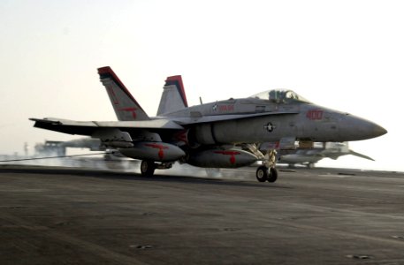 US Navy 050921-N-0361G-014 An F-A-18C Hornet makes an arrested landing on the flight deck aboard the nuclear-powered aircraft carrier USS Nimitz (CVN 68)