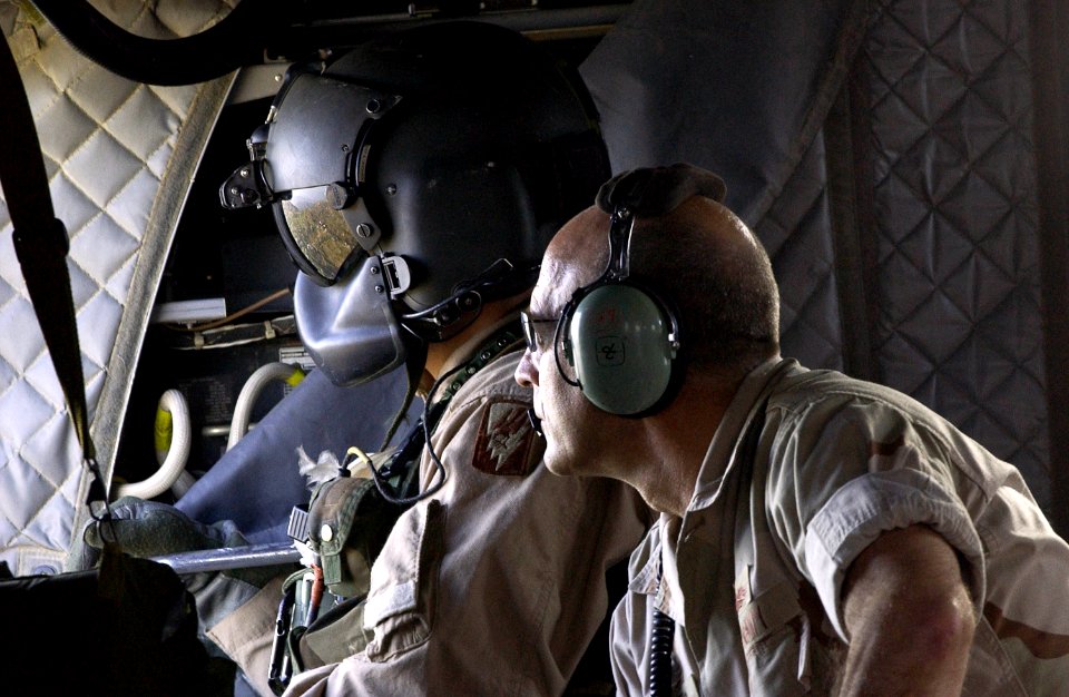 US Navy 051027-F-0571C-154 Commander, U.S. Disaster Assistance Center-Pakistan, U.S. Navy Rear Adm. Michael Lefever, looks over the relief efforts in Muzaffarabad, Pakistan