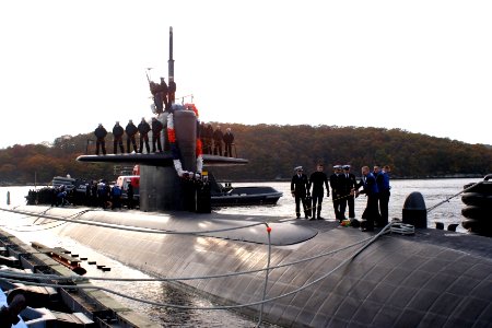 US Navy 051103-N-0653J-004 Sailors aboard the Los Angeles-class fast attack submarine USS Memphis (SSN 691), work together to moor their submarine photo