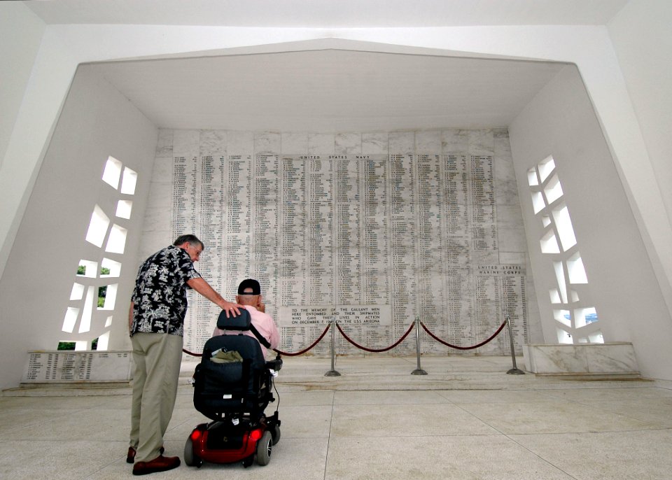 US Navy 051021-N-3019M-003 Pearl Harbor Survivor Hubert Harry Keil (right) views the USS Arizona Memorial for the first time since seeing her sink more than 60 years ago