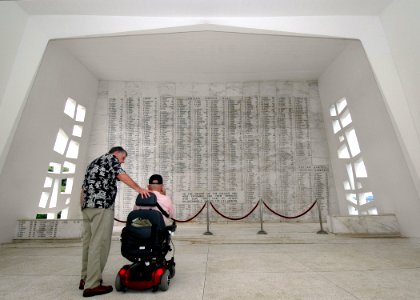 US Navy 051021-N-3019M-003 Pearl Harbor Survivor Hubert Harry Keil (right) views the USS Arizona Memorial for the first time since seeing her sink more than 60 years ago