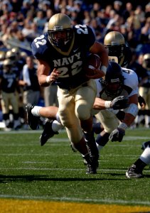 US Navy 051015-N-9693M-002 U.S. Naval Academy Midshipman full back Adam Ballard rushes for a touchdown in the 1st quarter of play against the Kent State Golden Flashes