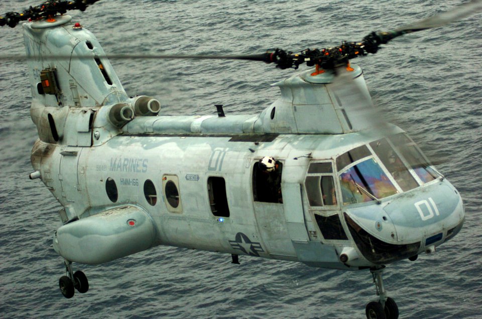 US Navy 051108-N-9866B-106 A U.S. Marine Corps CH-46E Sea Knight helicopter, assigned to Marine Medium Helicopter Squadron One Six Six (HMM-166), prepares to land on the flight deck of the amphibious assault ship USS Peleliu (L