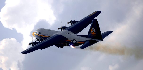 US Navy 050931-N-9769P-002 The U.S. Marine Corps C-130 Hercules, Fat Albert, assigned to the U.S. Navy Blue Angels flight demonstration team, uses Jet Assisted Take Off (JATO) bottles during the Mid-South Air Show photo