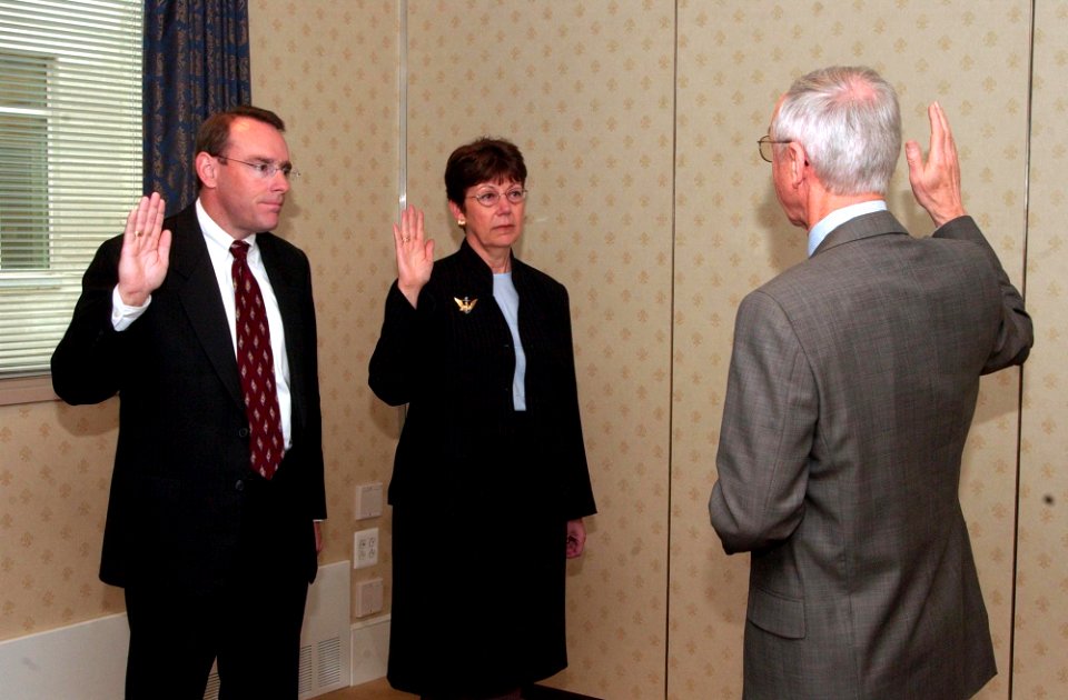 US Navy 051110-N-2568S-001 Secretary of the Navy and Acting Deputy Secretary of Defense Gordon England swears in John J. Young, Jr., left, as the new Director, Defense Research and Engineering, and Delores M. Etter as Assistant