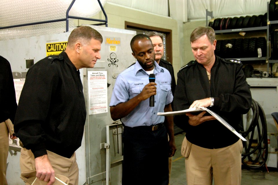 US Navy 051025-N-9999L-001 Commander, Naval Air Systems Command, Vice Adm. Wally Massenburg, right, and Assistant Commander, Aviation Deports, Rear Adm. Pete Williams, check supply records