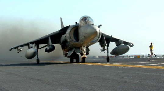 US Navy 051114-N-9866B-238 An AV-8B Harrier conducts a rolling take off from the flight deck of the amphibious assault ship USS Peleliu (LHA 5)