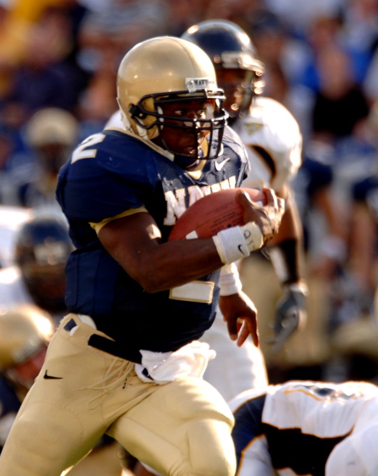 US Navy 051015-N-9693M-012 U.S. Naval Academy Midshipman Quarterback Lamar Owens rushes for yardage in the 4th quarter against the Kent State Golden Flashes