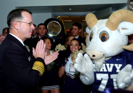 US Navy 051130-N-0295M-001 Chief of Naval Operations Mike Mullen applauds the U.S. Naval Academy cheerleaders and their mascot Bill the Goat during a Pep-Rally at the Pentagon