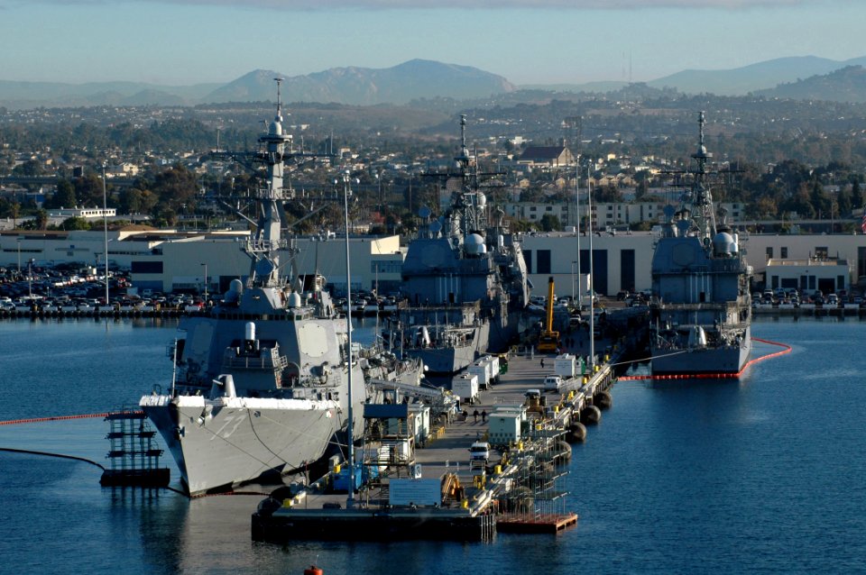 US Navy 051130-N-9866B-008 The guided missile destroyer USS Decatur (DDG 73) and two guided missile cruisers sit moored to their pier on board Naval Station San Diego in Southern California
